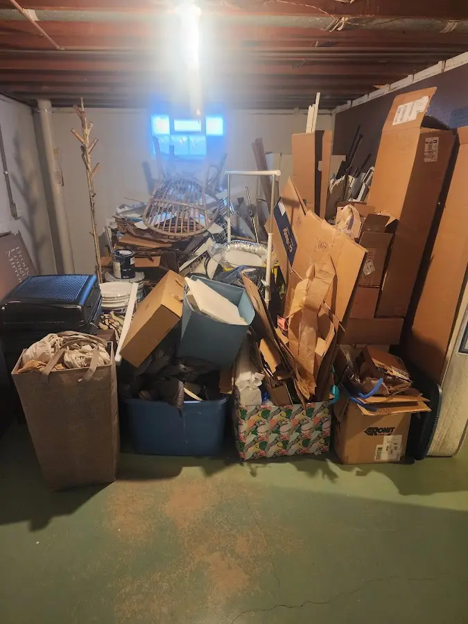 Roll-off dumpster container at job site for 6 Yard Dumpster Rental in Running Springs